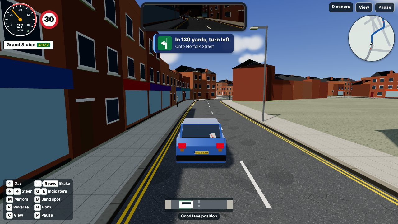 The game: driving towards a left turn with the sat nav instruction 'In 130 yards, turn left'